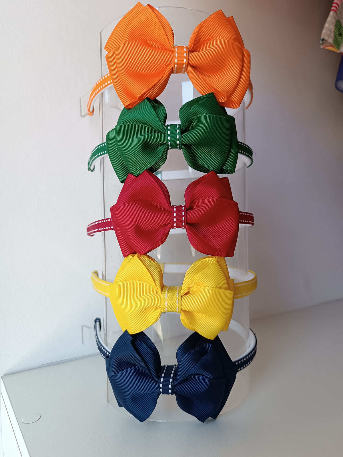Tiara laço cruzado duplo - Amarela